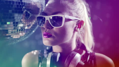 Beautiful-female-with-discoball-and-headphones