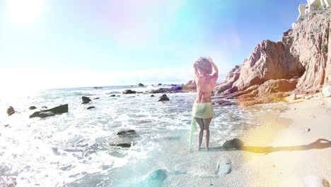 Woman-dancing-on-the-beach