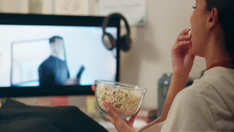 Computer,-web-video-and-popcorn-with-woman