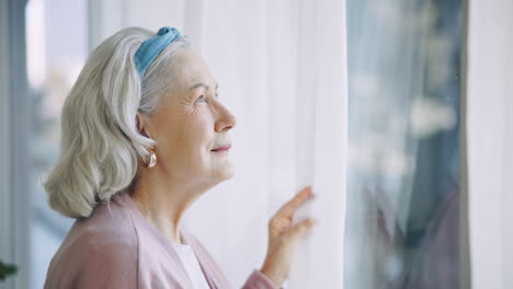 Thinking,-senior-and-woman-by-window-in-home