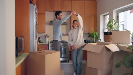 Dance,-couple-and-celebrate-moving-to-new-home