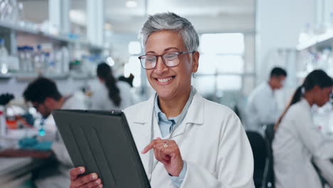 Senior-woman,-scientist-and-tablet-in-research