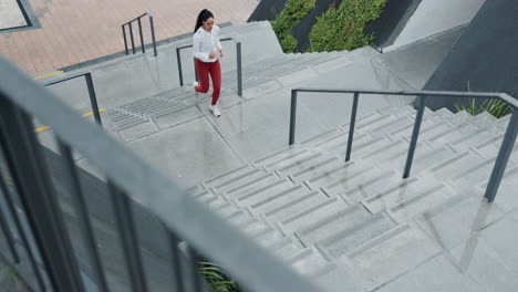 Fitness,-challenge-and-woman-running-on-stairs
