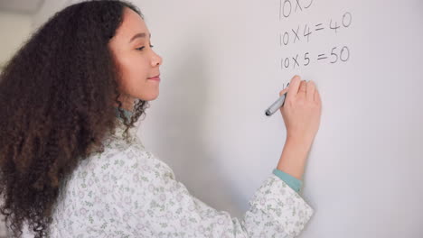 Teacher-woman,-writing-and-board-for-math