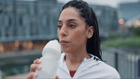 City.-fitness-and-woman-drinking-water