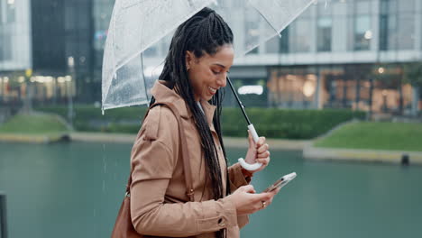 Phone,-walking-and-woman-in-rain-with-gps-in-city