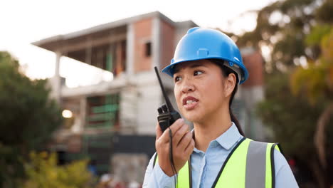 Asian-woman,-architect-and-walkie-talkie