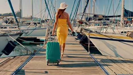 Yacht-travel,-suitcase-and-back-of-a-a-woman