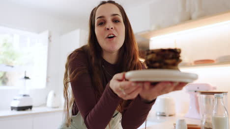 Cake,-face-and-woman-live-streaming-in-a-kitchen