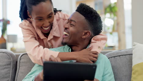 Black-couple,-tablet-and-laughing-in-living-room