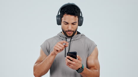 Man,-headphones-and-smartphone-with-music