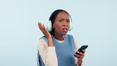 What,-hear-and-face-of-black-woman-with-headphones