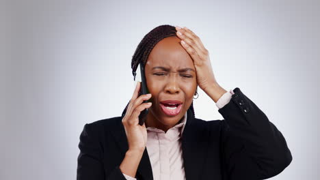 Phone-call,-stress-and-business-woman-in-studio