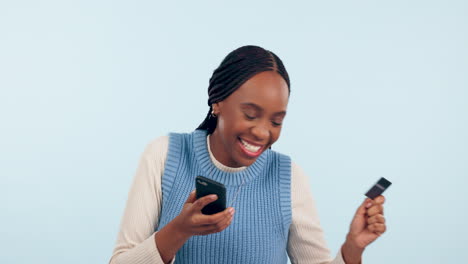 Woman-winner,-credit-card-and-phone-for-online