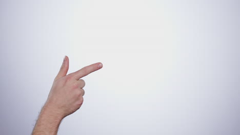 Hand,-pointing-and-person-in-studio-with-mockup