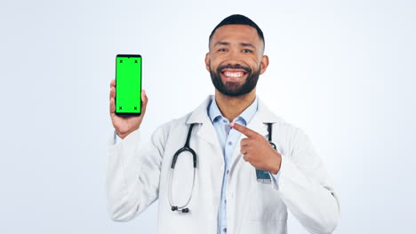 Doctor,-phone-and-green-screen-presentation
