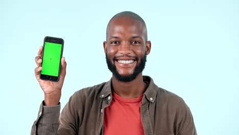 Face-smile,-phone-and-black-man-on-green-screen