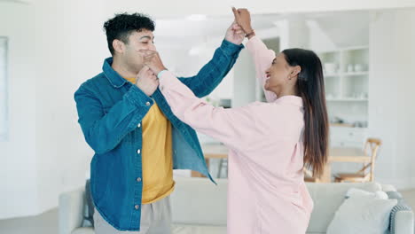 Dance,-energy-and-love-with-couple-in-living-room