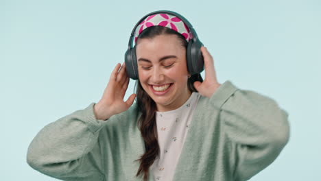 Studio-music,-headphones-and-happy-woman