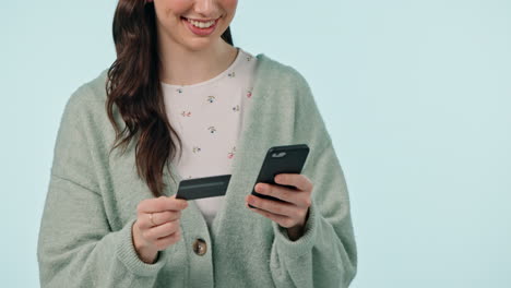 Hands,-phone-and-credit-card-with-a-woman-customer