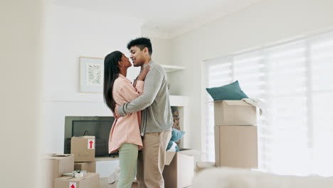 Dancing,-couple-and-kiss-to-celebrate-new-home