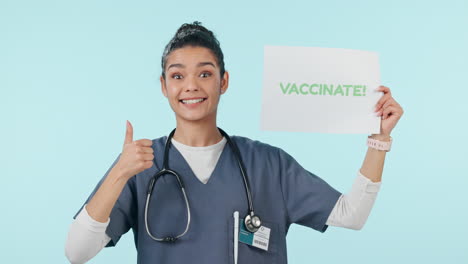 Nurse,-face-and-pro-vaccination-sign-with-thumbs