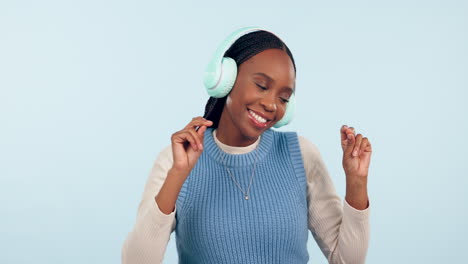 Black-woman,-dance-and-music-headphones-in-studio