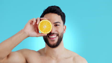 Face,-orange-and-skincare-smile-with-a-man