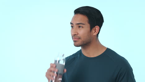 Asian-man,-fitness-and-drinking-water-for-natural