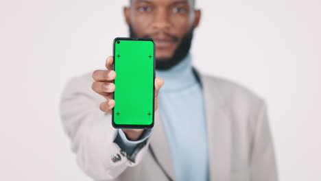 Phone,-black-man-and-green-screen-in-studio