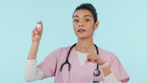 Woman-is-pointing-at-vaccine-bottle