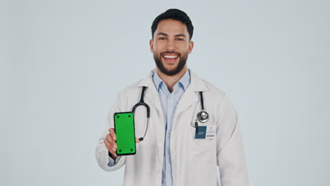 Doctor,-phone-and-green-screen-for-social-media