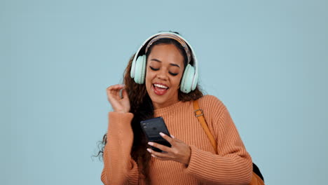 Student,-phone-and-a-woman-dancing-with-headphones