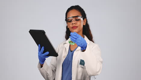 Scientist-woman,-tablet-and-glass-flask