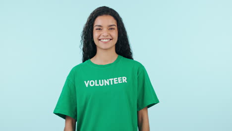 Volunteer,-woman-with-thumbs-up-and-face