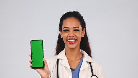 Doctor,-phone-and-green-screen-presentation