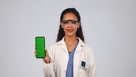 Woman,-scientist-and-green-screen-of-phone