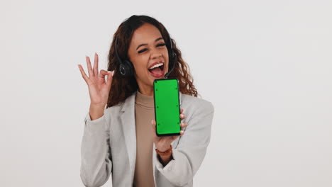 Call-center,-woman-and-green-screen-phone-with-ok