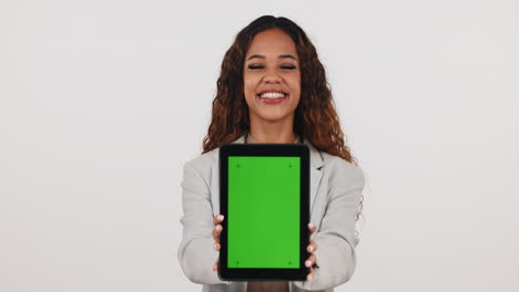 Green-screen,-tablet-and-face-of-woman-in-studio