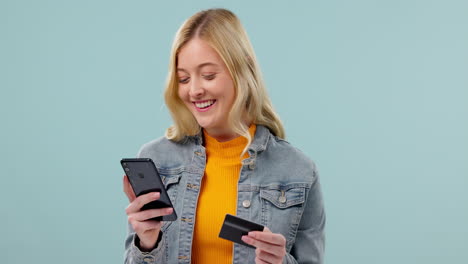 Credit-card,-smartphone-and-ecommerce-with-woman