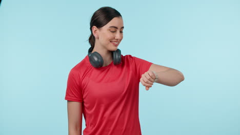 Smile,-watch-and-a-fitness-woman-with-headphones