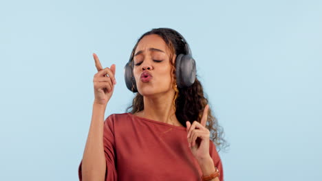 Woman,-dancing-and-headphones-for-music-in-studio
