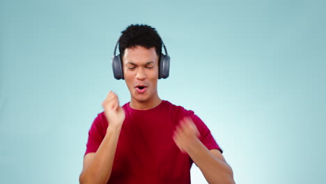 Man,-headphones-and-energy-with-drums-and-music