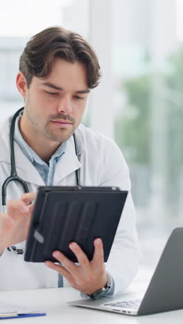 Tablet,-doctor-and-laptop-in-office-for-research