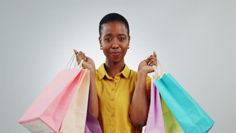 Black-woman-dancing-with-shopping-bag