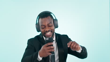 Business,-phone-and-black-man-dance-to-music