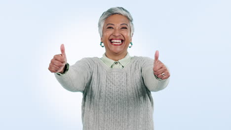 Face,-funny-and-senior-woman-with-thumbs-up