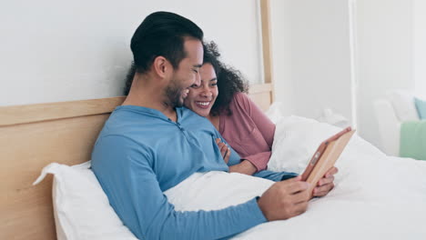 Tablet,-laughing-and-couple-in-bed-networking