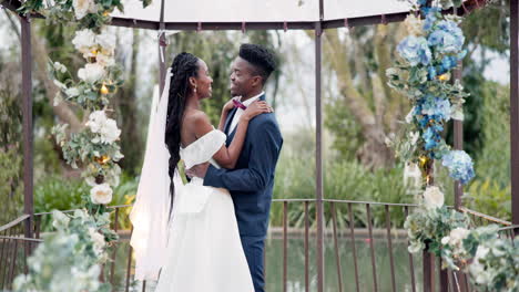 Wedding,-dance-and-kiss-with-happy-black-couple