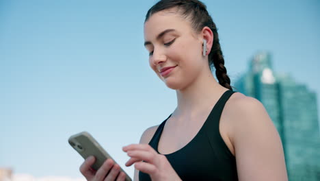 Phone,-fitness-and-woman-networking-in-the-city